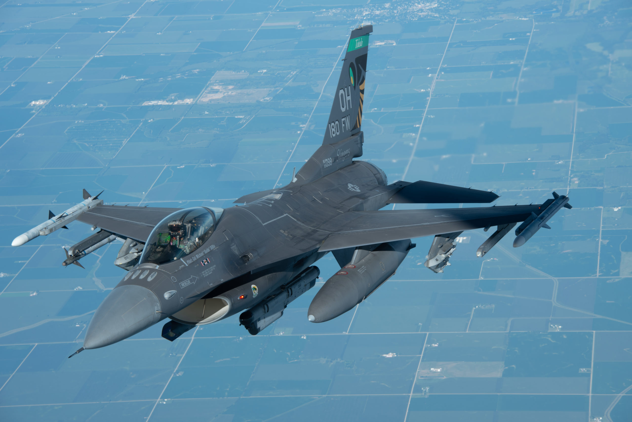 A U.S. Air Force F-16 Fighting Falcon of the Ohio Air National Guard’s 180th Fighter Wing flies over Iowa Aug. 11, 2022. The F-16 was on its way to the Field of Dreams Major League Baseball game to perform a flyover during the playing of the US National Anthem. (U.S. Air National Guard photo by Airman 1st Class Tylon Chapman)