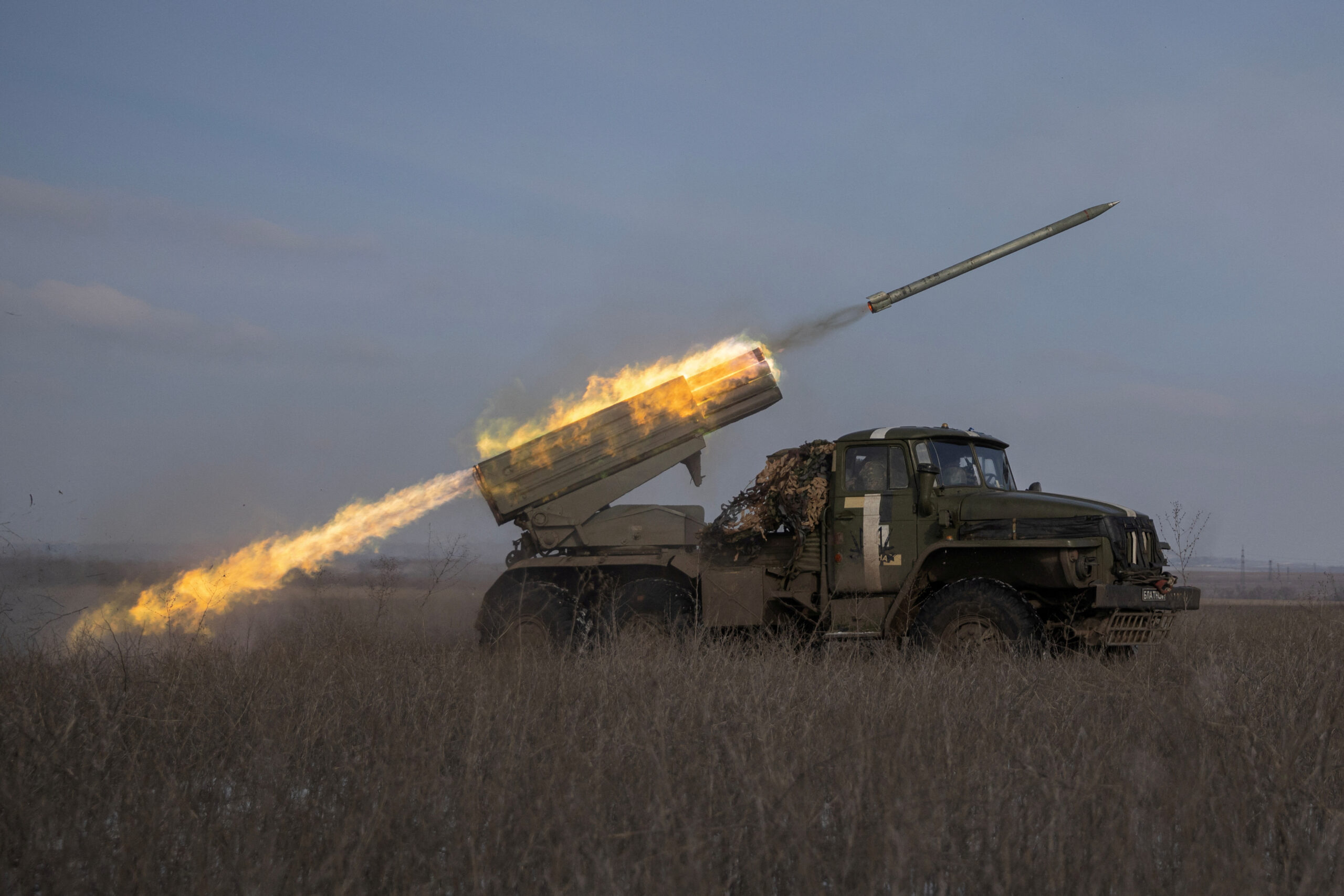 Ukrainian servicemen fire a BM-21 Grad multiple launch rocket system towards Russian positions on a frontline near the town of Marinka, amid Russia's attack on Ukraine, in Donetsk region, Ukraine, February 7, 2023. REUTERS/Marko Djurica TPX IMAGES OF THE DAY