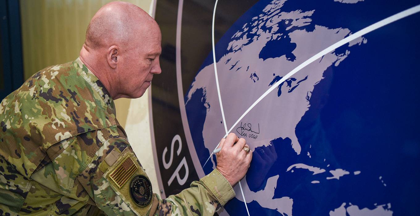 General John Raymond, U.S. Space Force chief of space operations, signs the United States Space Command sign inside of the Perimeter Acquisition Radar building Jan. 10, 2020, on Cavalier Air Force Station, North Dakota. Raymond toured inside the PAR building, where he learned first-hand how operations work inside the facility and listened to Airmen   s suggestions.Space Force